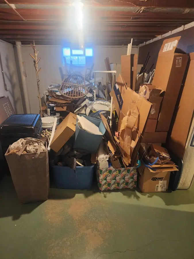 Roll-off dumpster container at job site for 15 Yard Dumpster Rental in Evergreen